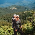 Man with Baby on Mountain